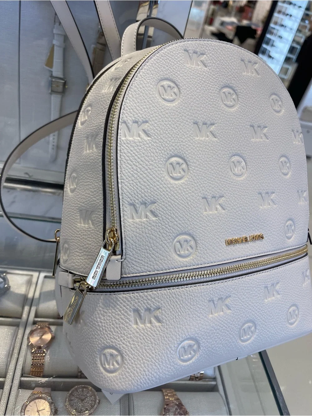Michael Kors Rhea Medium Zip Logo Debossed Backpack Light Cream NWT
